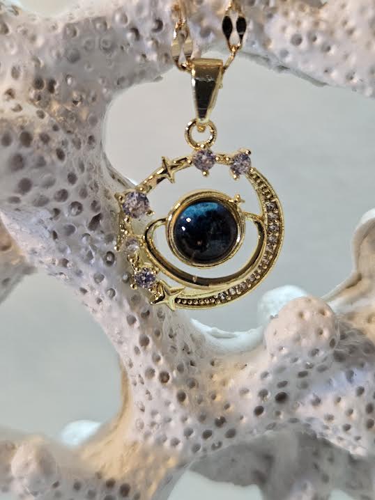 💫🌙 “Shine like the night sky ✨🌌 This golden moon & star pendant with a cosmic gemstone is pure celestial magic you can wear!” 💎⭐