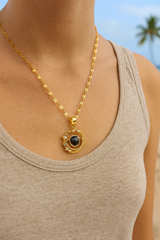 💫🌙 “Shine like the night sky ✨🌌 This golden moon & star pendant with a cosmic gemstone is pure celestial magic you can wear!” 💎⭐