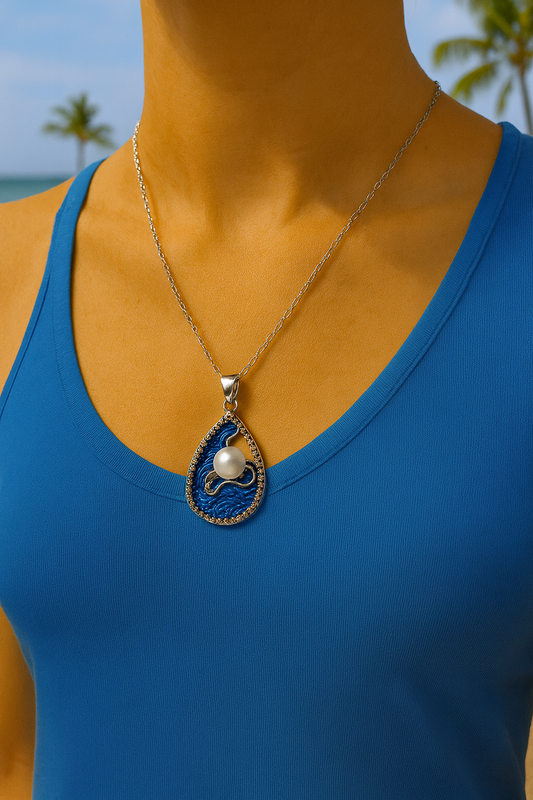 ✨🐚 “Ocean vibes you can wear 🌊💫 This stunning wave pendant with pearl detail is made to shimmer like the sea!” 💎🧜‍♀️💙